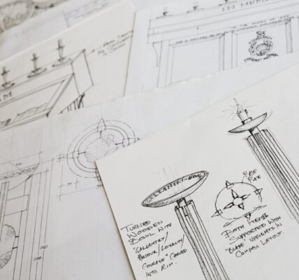 Rola scenografa w kreowaniu świata filmowego 6 close-up-of-design-drawings-for-a-carved-wooden-bo-2023-11-27-05-01-42-utc